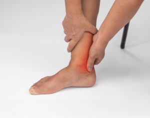 A middle-aged woman with fever, severe pain, and swelling in the ankle